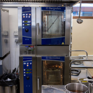 Тепловое оборудование Electrolux для кухни ресторана и кафе. Дизайн-отель СтандАрт 5*, Москва. На фото башенная установка пароконвектоматов Electrolux на 10 и 6 уровней.