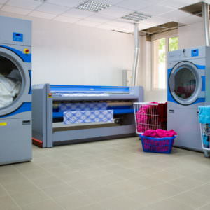 Прачечное оборудование Electrolux. Коммерческая прачечная, Симферополь. На фото сушильные машины и гладильный каток Electrolux.